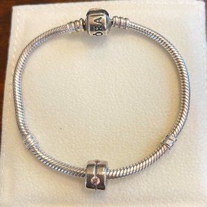 Silver Pandora charm with pink gemstones